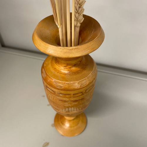 Wooden vase made of beech with traditional carved geometric patterns