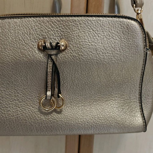Shoulder bag in metallic gold color like new