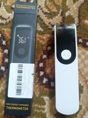 Infrared Thermometer new, non-contact, uses 2 AAA batteries