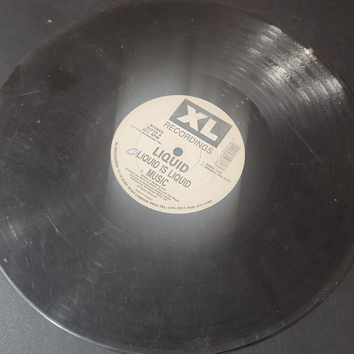 Liquid vinyl record used with scratches
