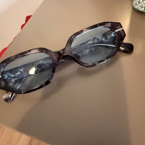 Glasses with blue transparent lens like new, turtle design