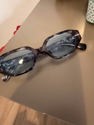 Glasses with blue transparent lens like new, turtle design