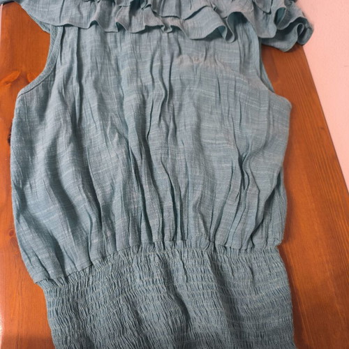 Blouse sleeveless turquoise size S used with decorative buttons