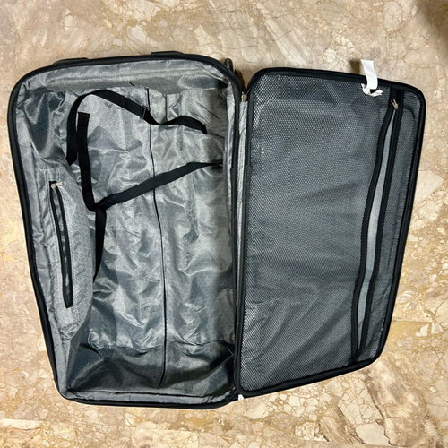 Travel suitcase used, black, dimensions 75x45x25
