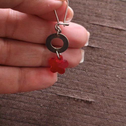 Handmade dangling earrings used with red crystal flower design