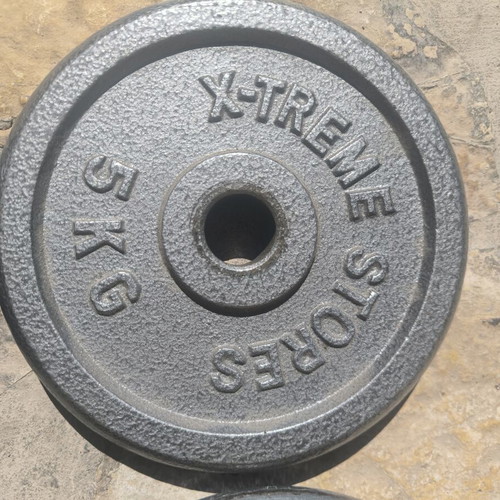 Dumbbell set used with weight plates for home training