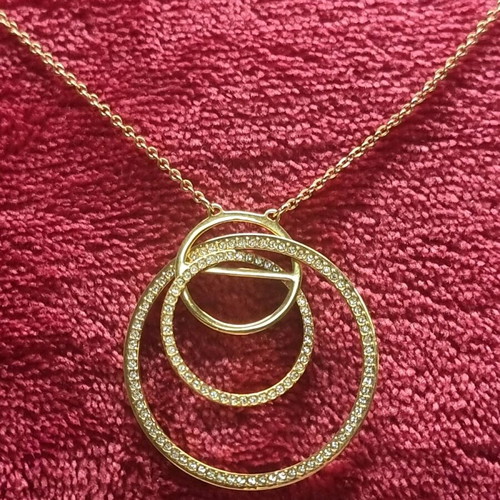 Swarovski necklace like new, gold color