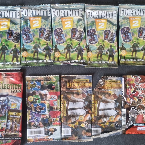 10 sealed metal tag packets, Fortnite and more