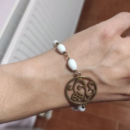 Silver bracelet new with white beads and metal detail