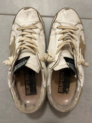 Golden Goose women's shoes with star design