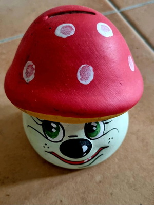 Mushroom piggy bank used in good condition
