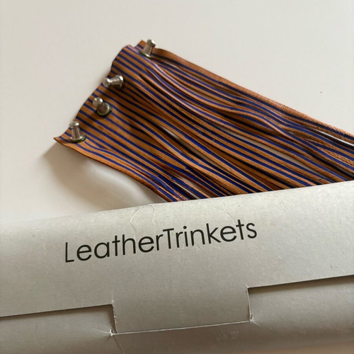 Leather bracelet used brown with blue details