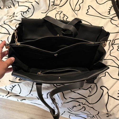 Bag used, spacious, lightweight with London keychain