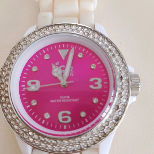Ice Watch wristwatch used with pink dial missing 2-3 diamonds