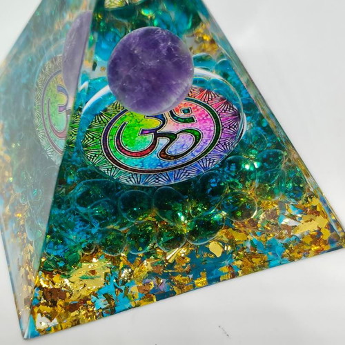 Orgonite pyramid with amethyst and Om symbol like new
