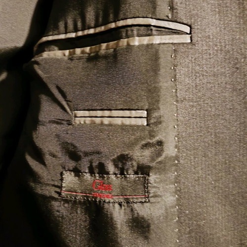 Glou suit black like new, made in Italy, size L
