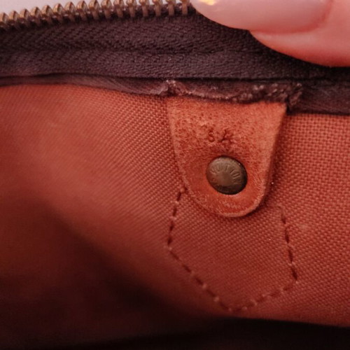 Louis Vuitton Speedy 30 handbag used, brown, zipper replaced, slight discoloration