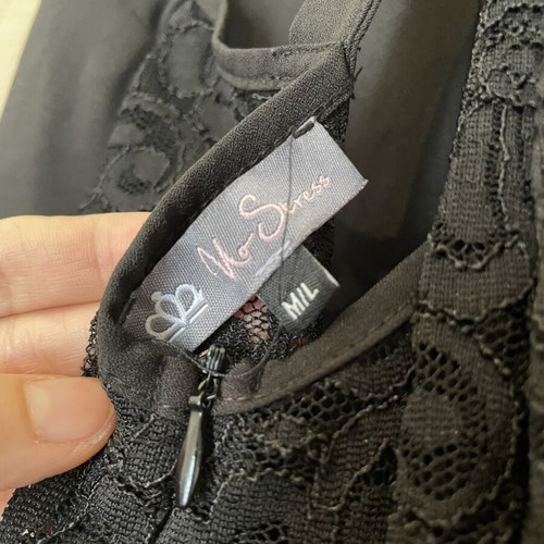 Black playsuit used with lace details and open back, size M