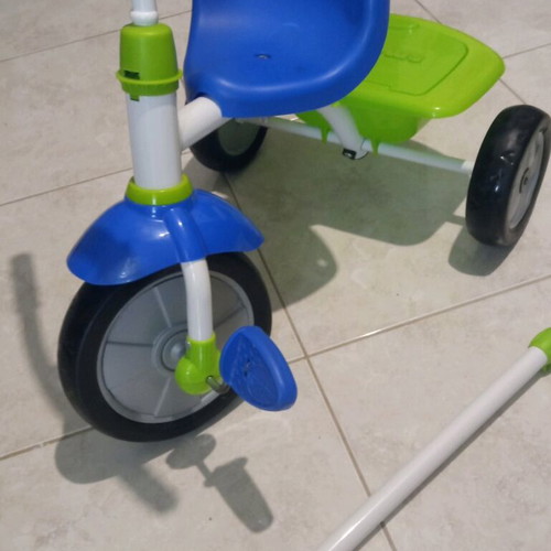 Children's tricycle bike with handle like new, blue and green