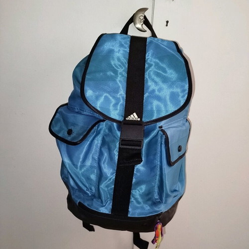 Adidas backpack used, turquoise waterproof with 2 outer pockets