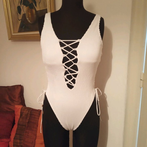One-piece swimsuit used, white, size M with laces