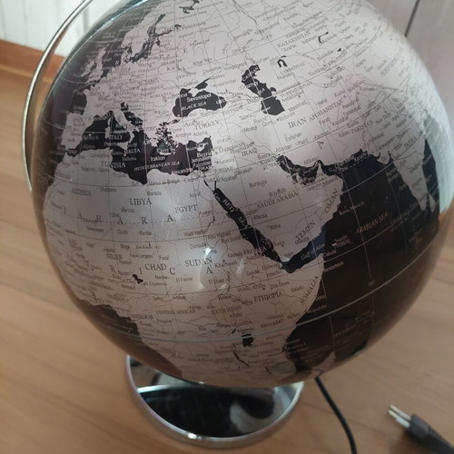 Black and white globe lamp with switch