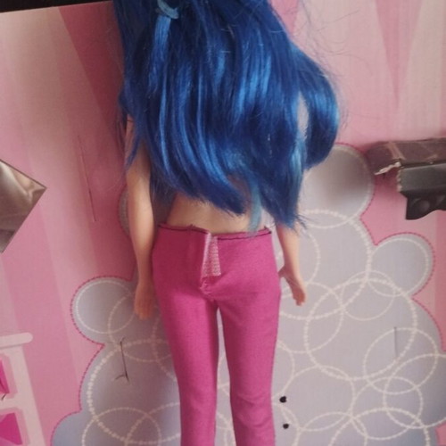 Barbie doll with blue hair