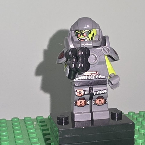 LEGO CMF Series 9 Alien Avenger minifigure with cracks on arms
