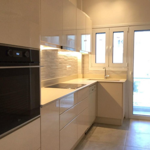 Modern kitchen with quartz countertop and granite undermount sink like new, beige lacquer