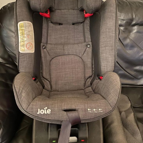 Joie car seat used with isofix base and protective cover