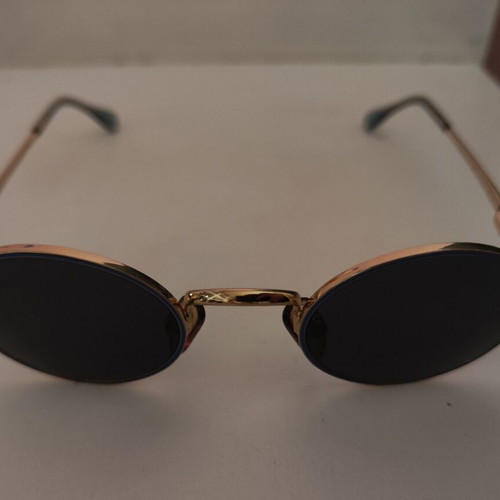 Vogue children's sunglasses like new, black and gold