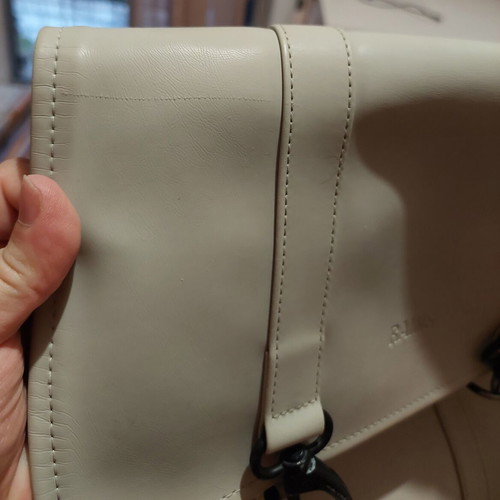Rains backpack used, gray color, small inner pocket