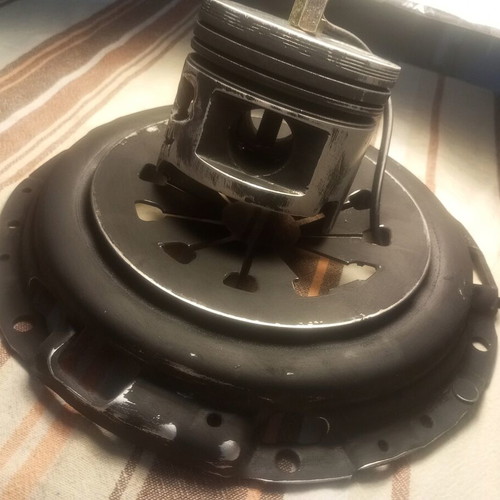 Handmade desk lamp with piston and clutch plate in deep black mat