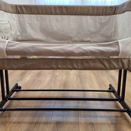 Chipolino double-level baby cot with mosquito net and wheels