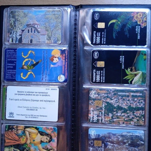 Phone cards like new, set of 48 in album 1