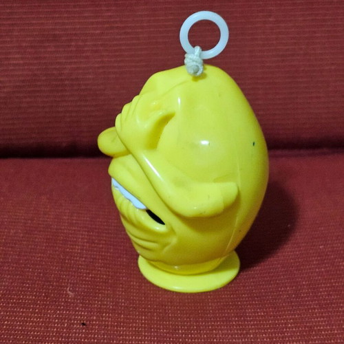 Wind-up figure used that vibrates