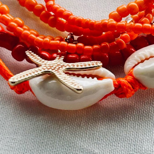 Set of 7 Boho Bracelets new with Shells and Starfish Orange