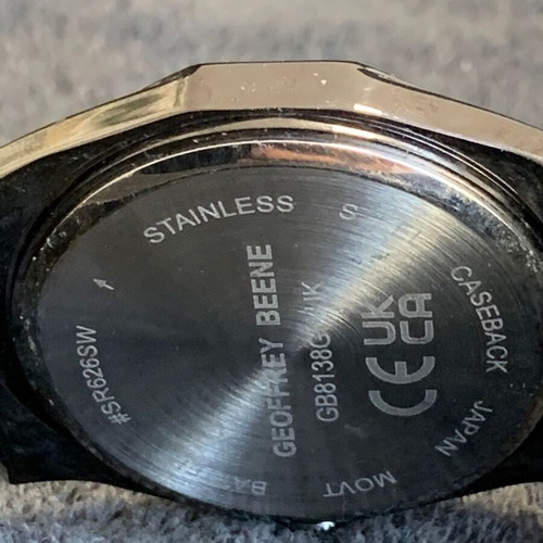 Geoffrey Beene Black Diamond men's watch used with gray dial