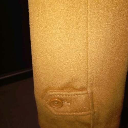 Coat new in camel color, size XL