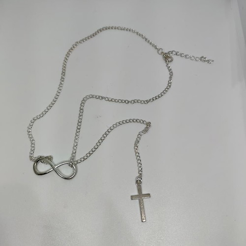 Silver necklace with infinity and cross symbols like new