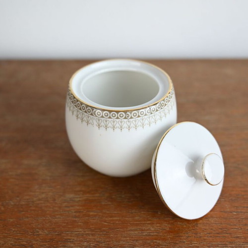 Vintage porcelain sugar bowl with lid used, gold trim