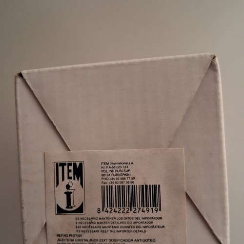 ITEM International glass oil bottle with stainless steel casing