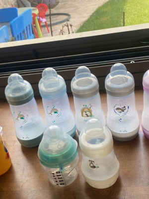 Mam Mum Tommie Tippie baby bottles and pacifier cases used