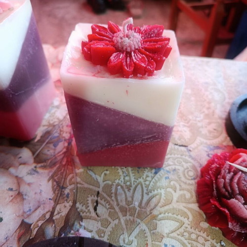 Handmade decorative candles with wax art