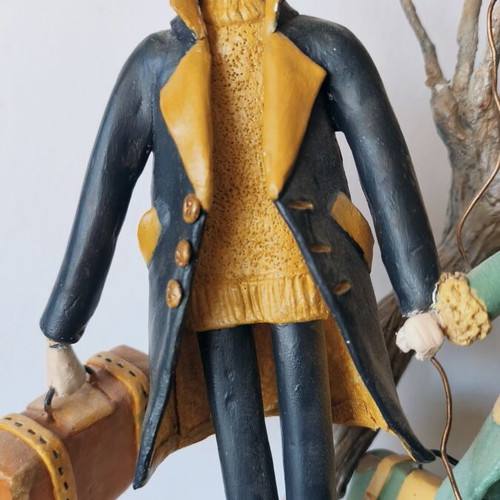 Handmade sculpture couple on globe by Nasia Soul
