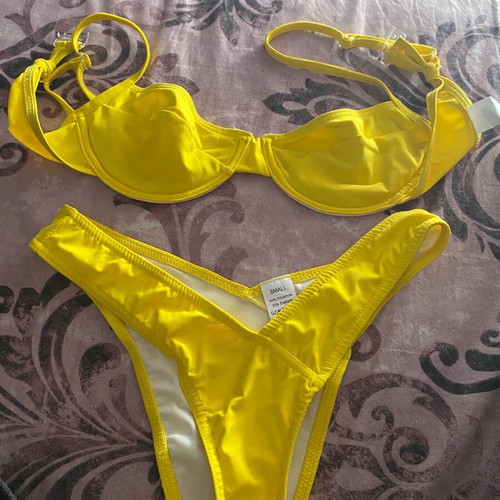 Luigi swimsuit size S yellow, unused