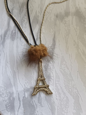 Necklace with Eiffel Tower and decorative fur pompom like new, black and gold