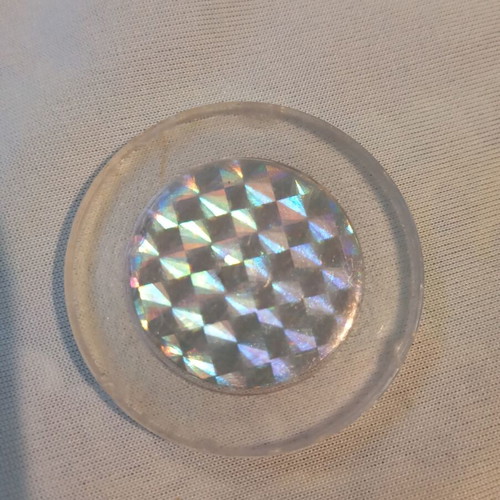 Collectible tazo cap with holographic superhero image used