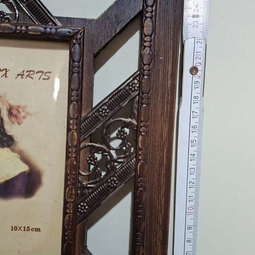 Wooden frame with metal details like new, classic decoration
