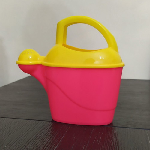 Children's watering can toy like new, height 18 cm, width 18 cm